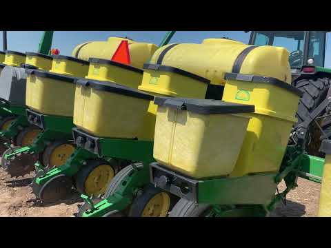 Resetting the lift height on a JD 7200 planter, planting soybeans in NE.