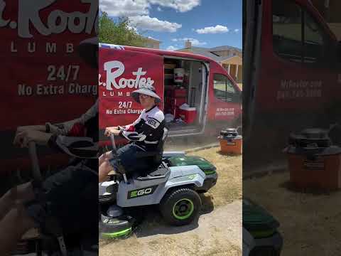 Blowing Grass Into Contractor's Van